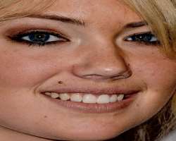 She has a mole just over her lip.